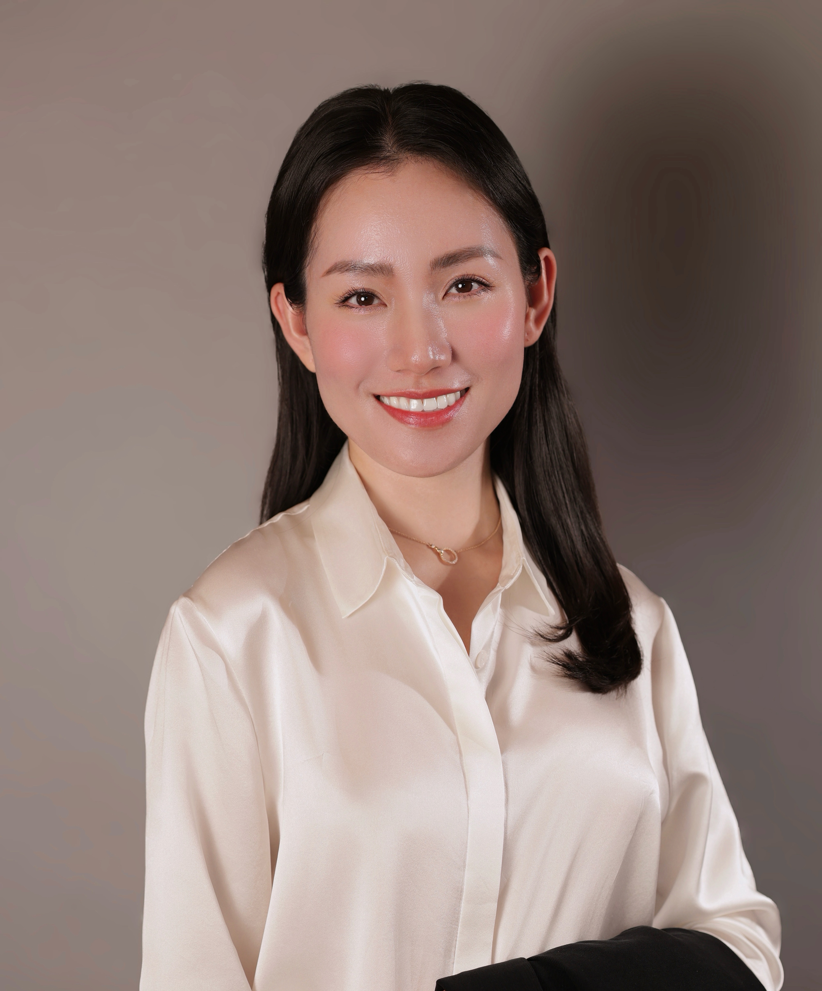 Nancy meeting clients in a modern living room